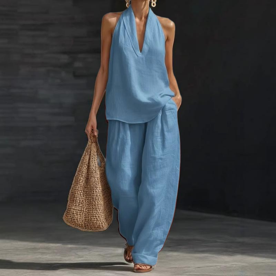 Completo da donna con top all'americana senza maniche e pantaloni a gamba larga