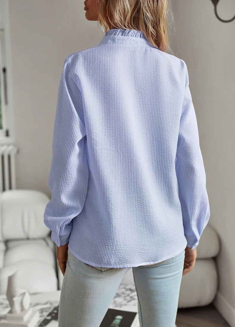 Blouse élégante pour femme avec boutons et volants