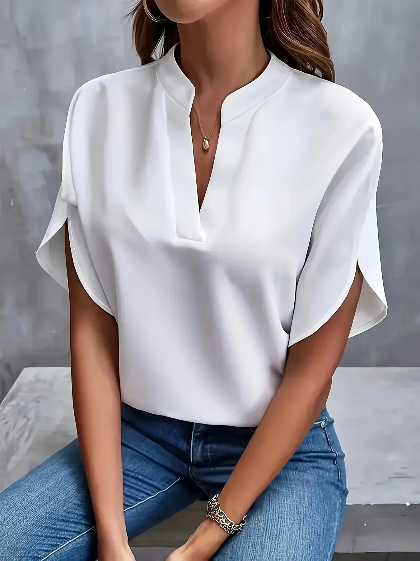 Blouse col en V femme coupe ample manches courtes