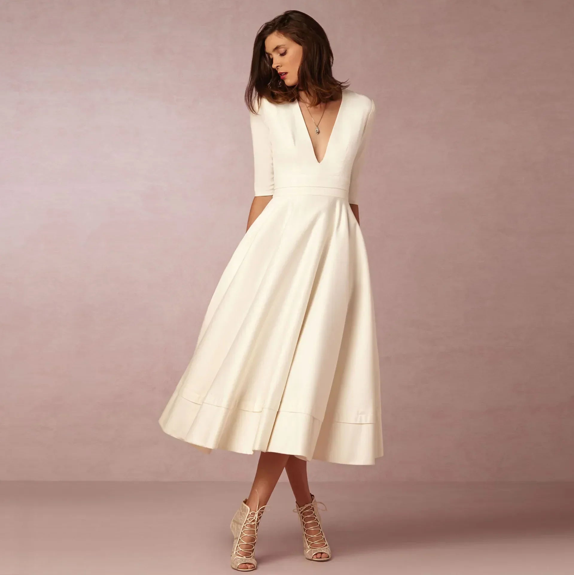 Robe midi élégante à col en V et manches coudes