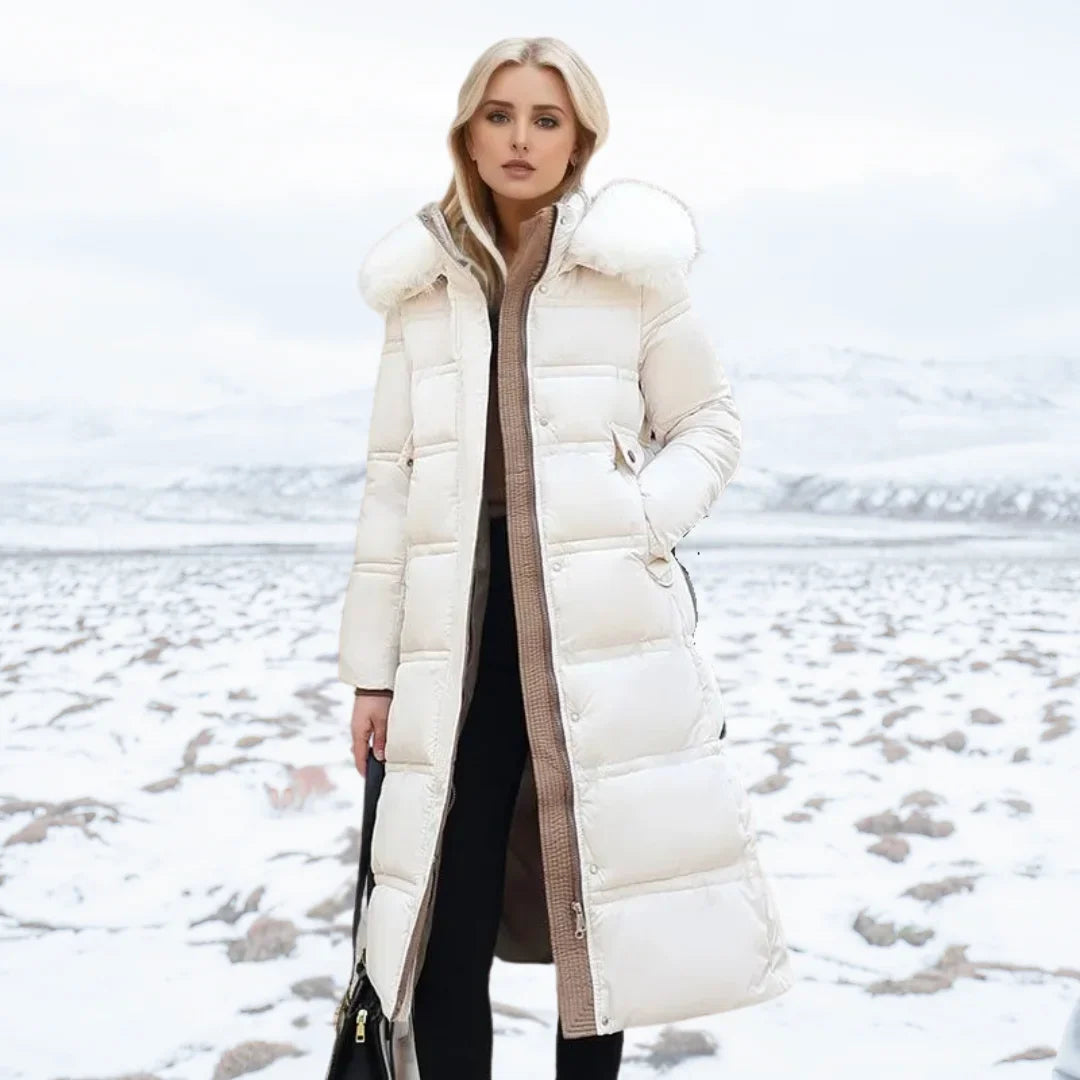 Parka longue matelassée pour femme avec capuche bordée de fausse fourrure