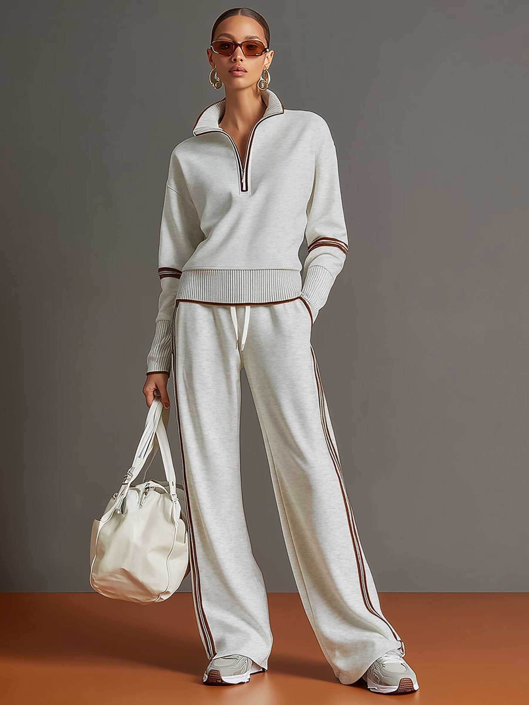 Completo coordinato donna con felpa mezza zip e pantaloni a gamba larga