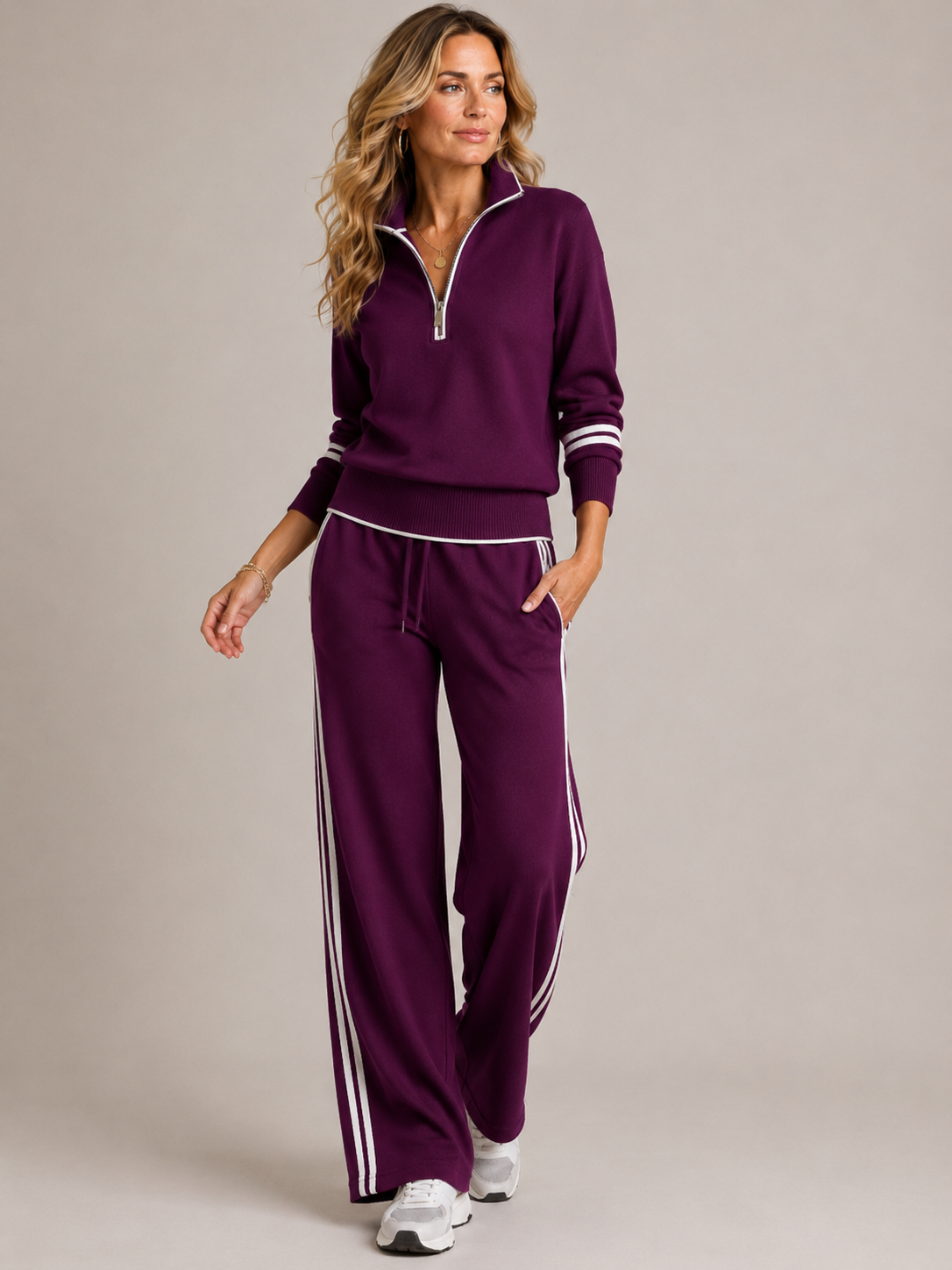 Conjunto de chándal para mujer con cremallera de un cuarto y pantalones a rayas