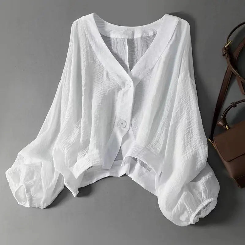 Blouse pour femme à col en V avec manches chauve-souris