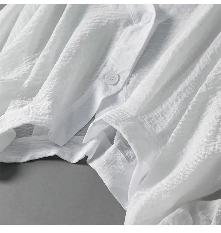 Blouse pour femme à col en V avec manches chauve-souris