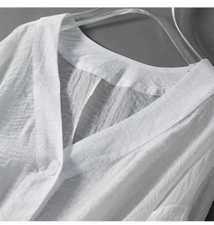 Blouse pour femme à col en V avec manches chauve-souris