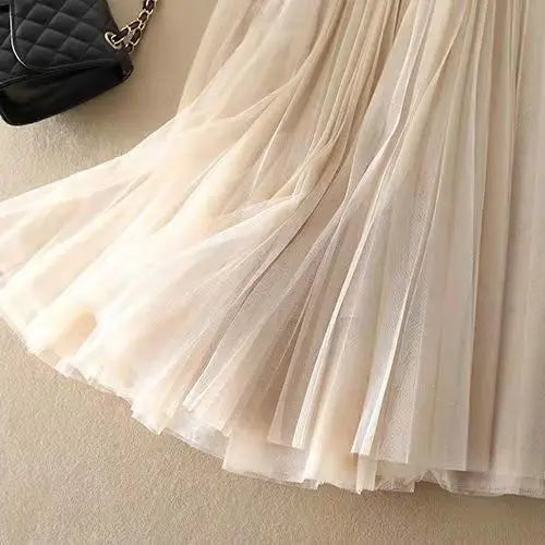 Jupe midi plissée pour femme avec silhouette taille haute