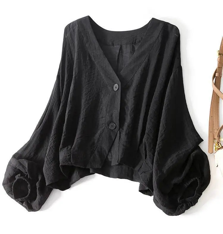 Blouse pour femme à col en V avec manches chauve-souris