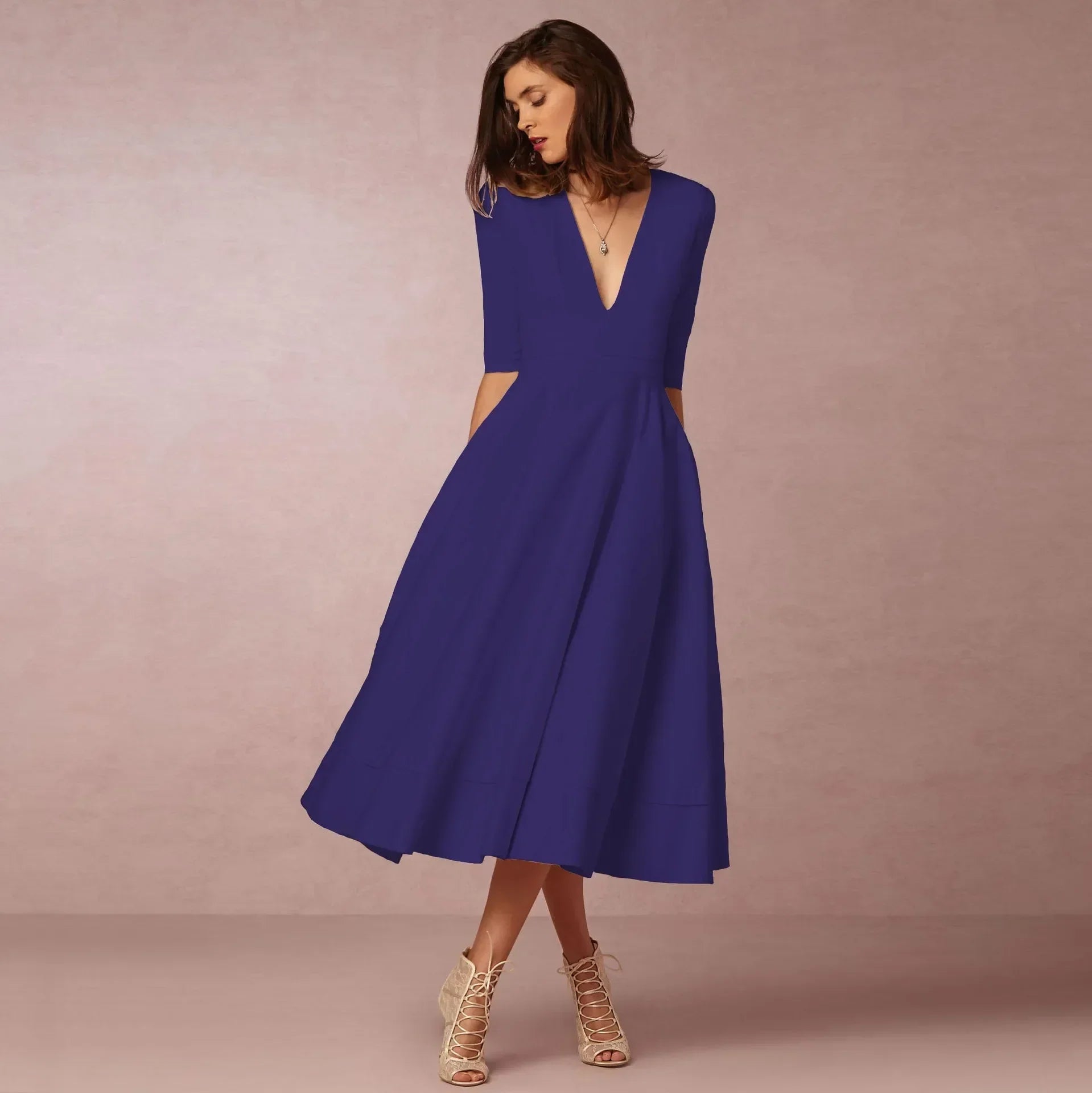 Robe midi élégante à col en V et manches coudes