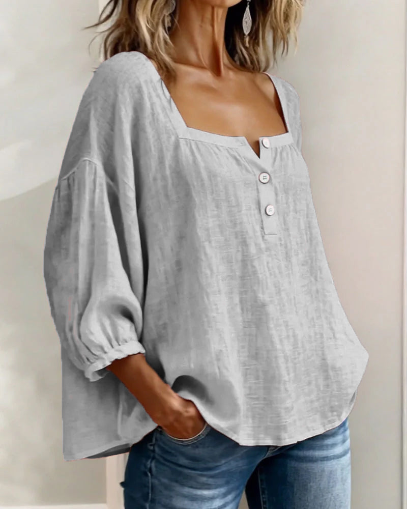 Blusa de mujer con escote cuadrado y mangas abullonadas