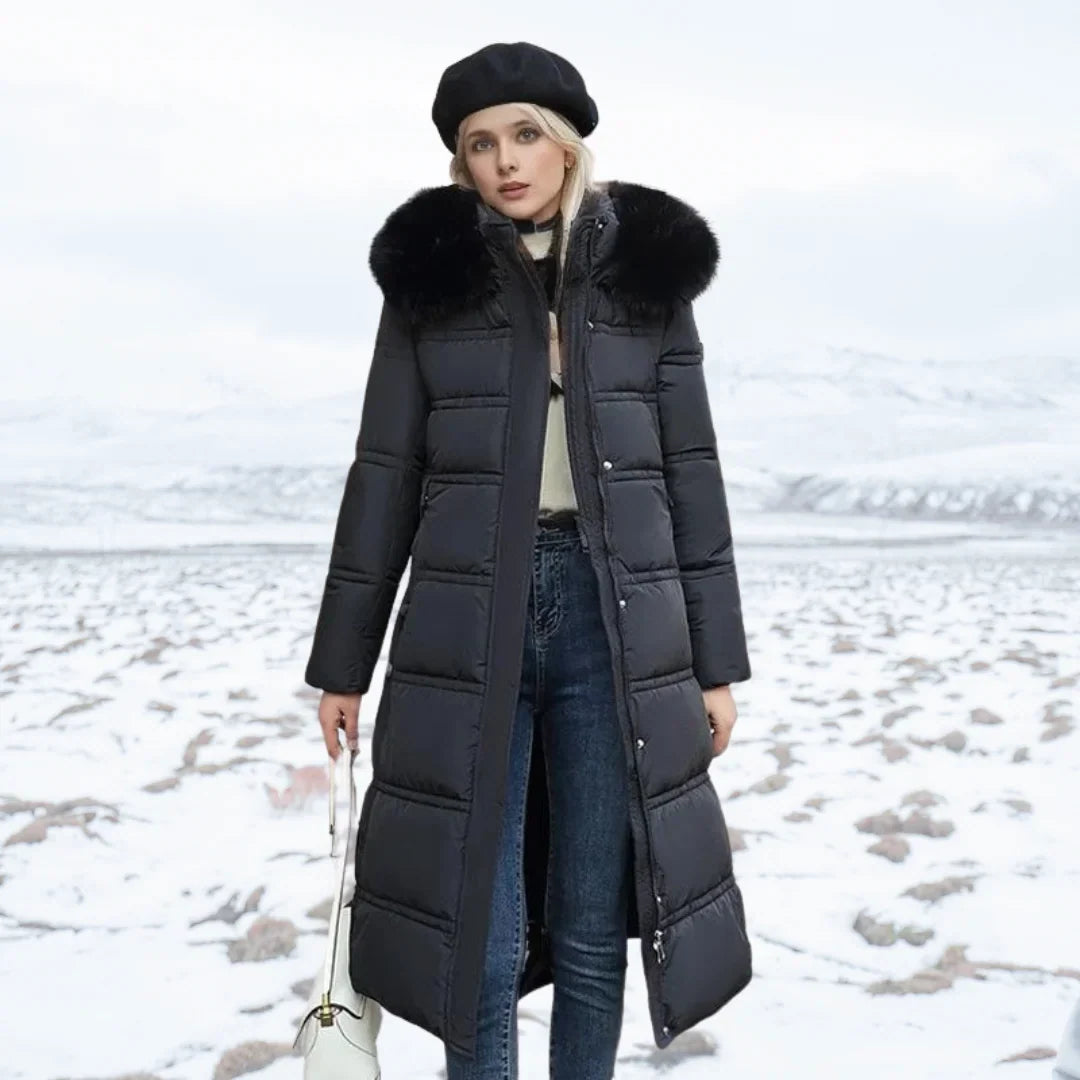 Parka longue matelassée pour femme avec capuche bordée de fausse fourrure