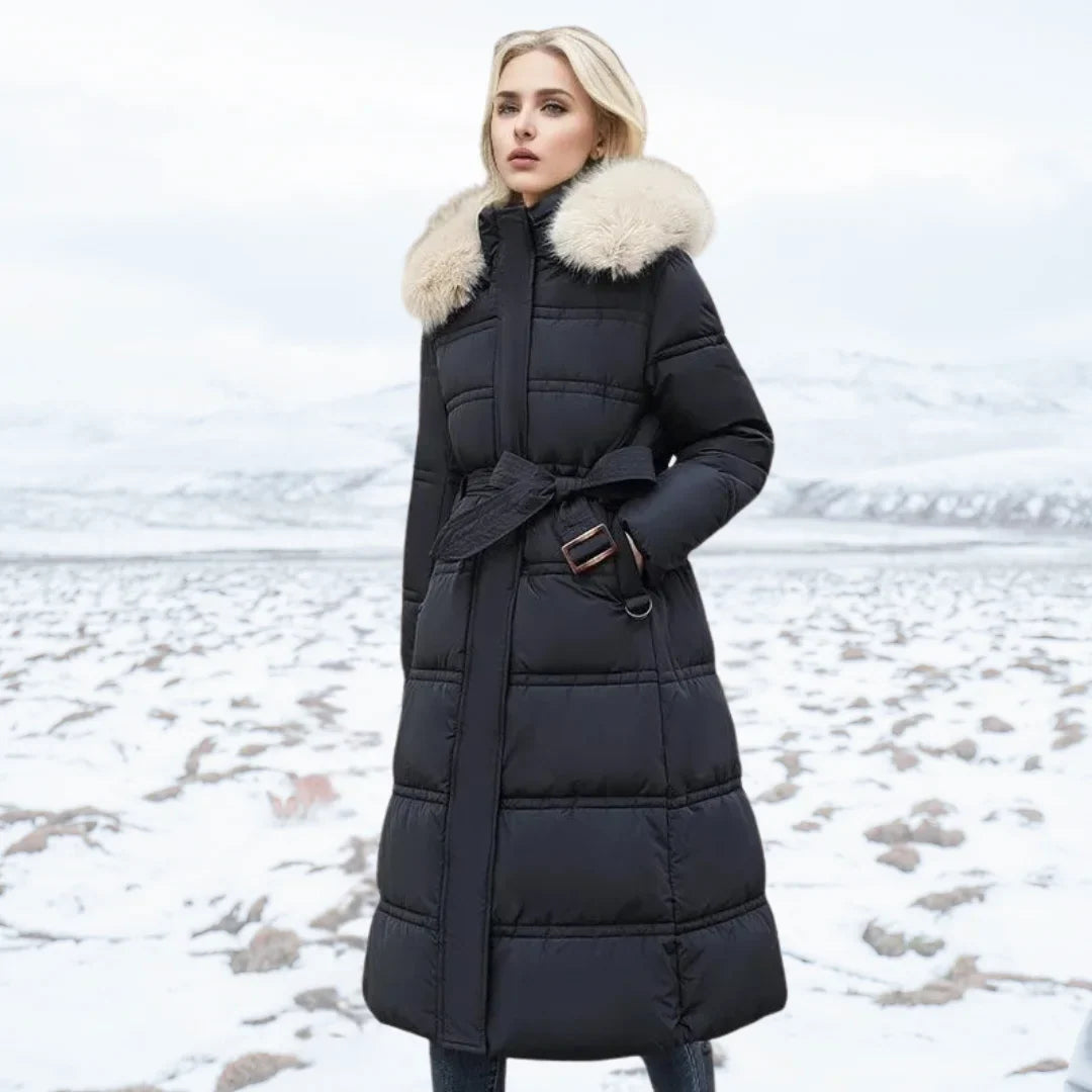 Parka longue matelassée pour femme avec capuche bordée de fausse fourrure