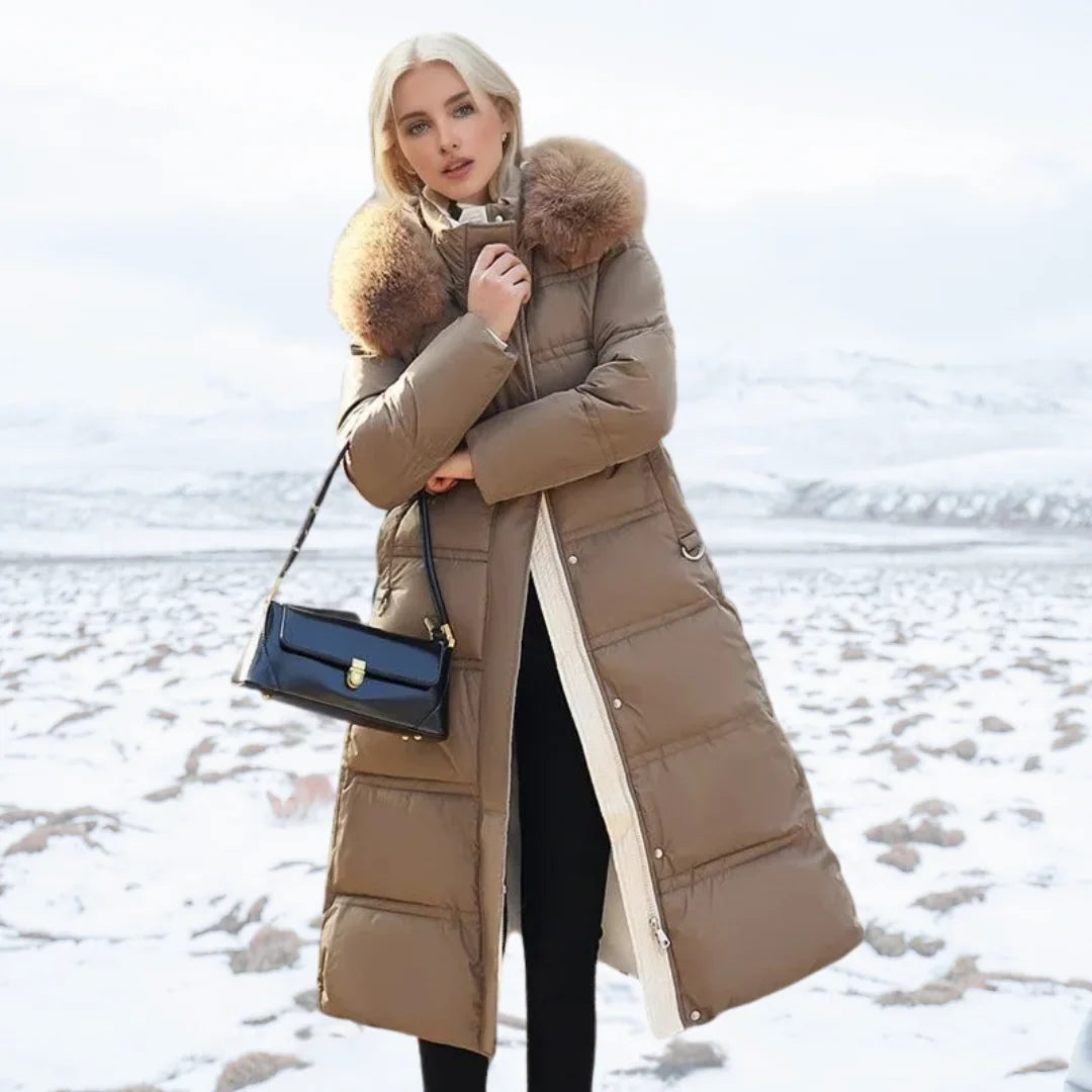 Parka longue matelassée pour femme avec capuche bordée de fausse fourrure