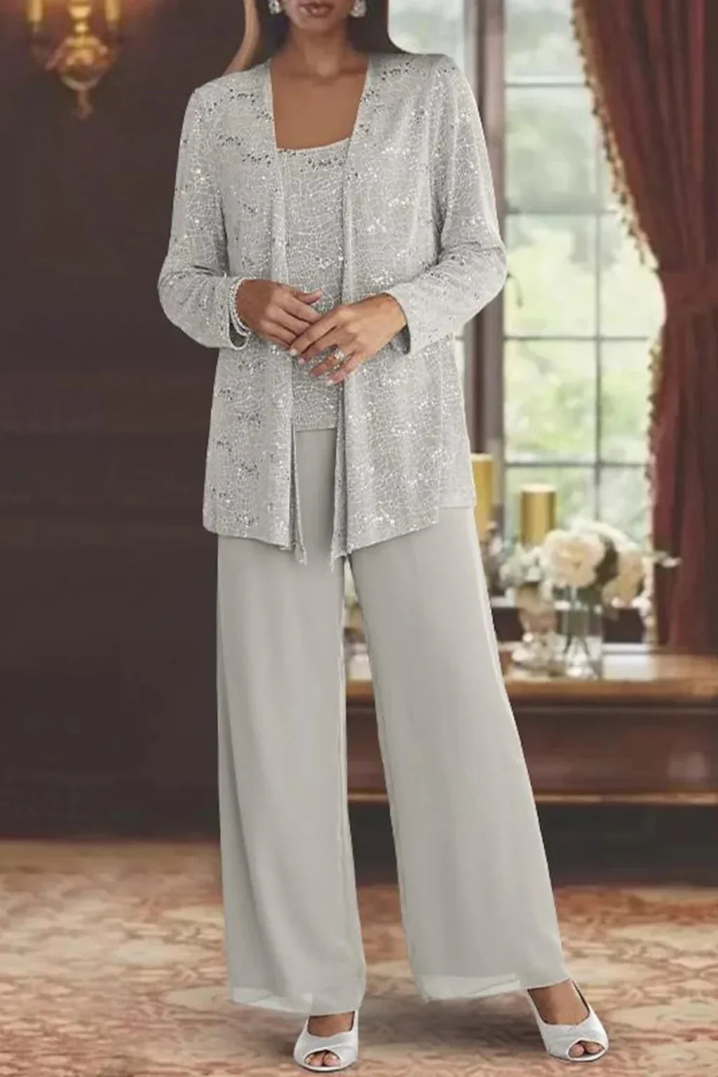 Completo elegante da donna con pizzo e paillettes, pantaloni a gamba larga, per invitate a un matrimonio