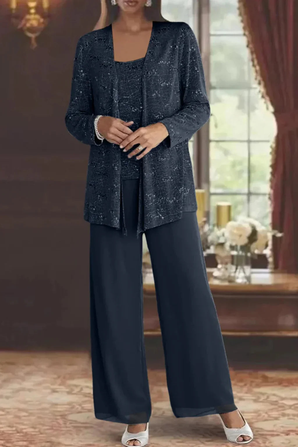 Completo elegante da donna con pizzo e paillettes, pantaloni a gamba larga, per invitate a un matrimonio