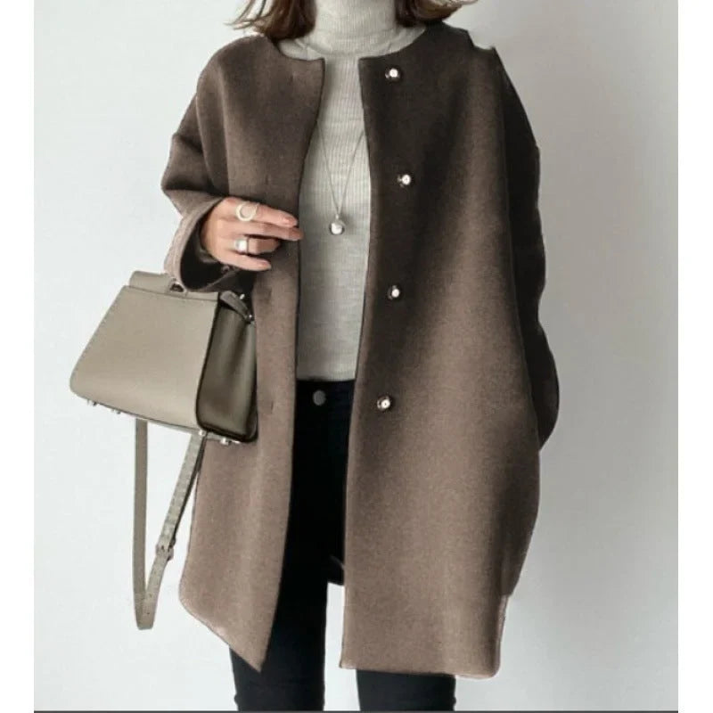 Manteau oversize minimaliste pour femme à boutons